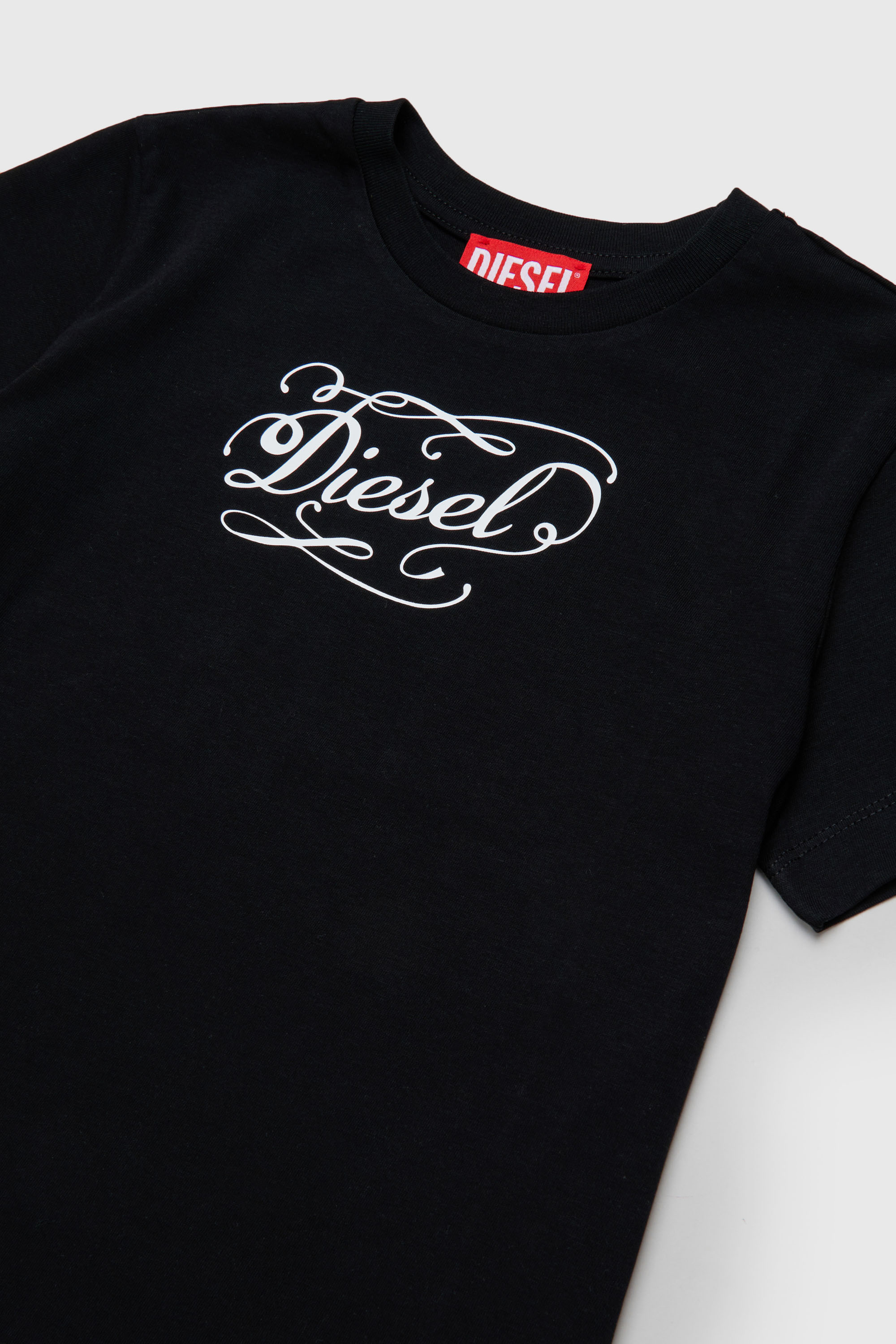 Diesel - TORSAL, Woman's Cotton T-shirt with whimsical logo print in Black - 3
